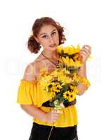 Beautiful woman with some sunflowers.