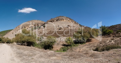 Twin round hills among Mediterranean landscape