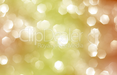 Abstract background with yellow and orange bokeh