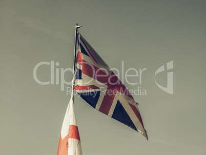 Vintage looking Flag of UK over blue sky