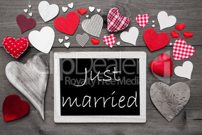 Chalkbord With Many Red Hearts, Just Married