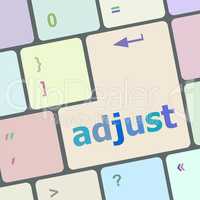 adjust button on the keyboard key close-up