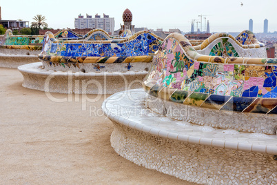 Detail of colorful mosaic work on the main terrace of Park Guell