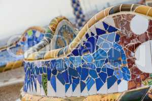 Detail of colorful mosaic work on the main terrace of Park Guell