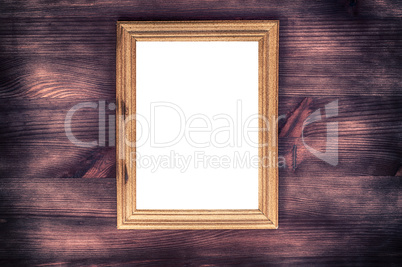 Empty wooden frame on a wood textured surface