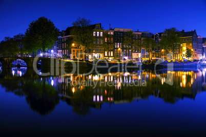 Amsterdam city view with canals and bridges