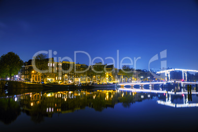 Amsterdam city view with canals and bridges