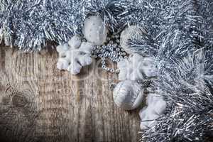 White christmas balls on a wooden background