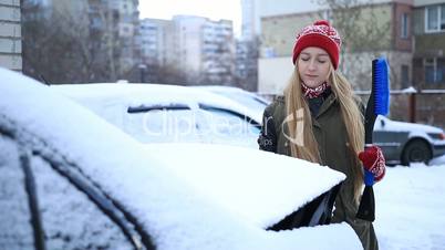 Cleaning car from snow every morning