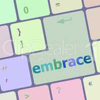 computer keyboard key with the word embrace on it