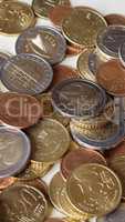 Many Euro coins - vertical