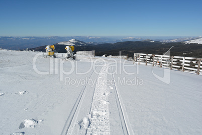 Snowmobile trail in fresh snow