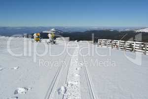 Snowmobile trail in fresh snow