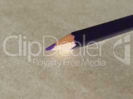 Violet pencil over paper