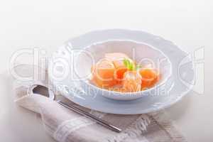 Apricot sorbet on a white plate