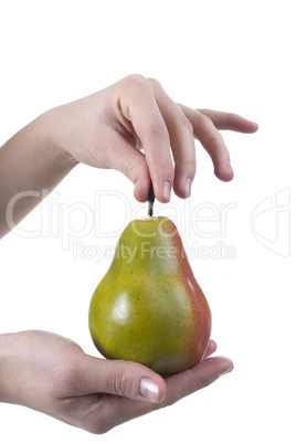 Hand with a pear