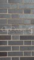 Black brick wall background - vertical