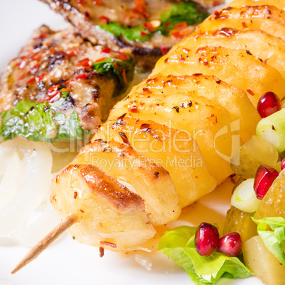 fried liver with fried potato and salt cucumbers