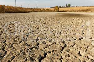 Arid and dried soil of pond bottom