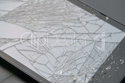 Photo of smartphone with fractured screen