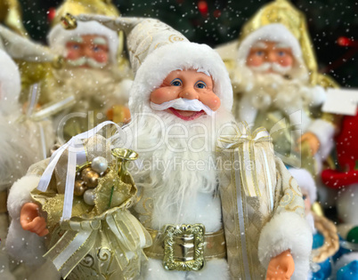 group of Santa Clauses with gifts
