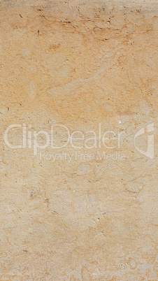 Yellow stone wall background - vertical