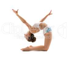 Beautiful female gymnast stretching and exercising