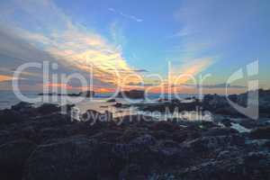 Long exposure of sunset over rocks