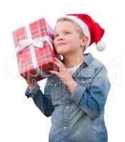 Young Boy Wearing Santa Hat Holding Christmas Gift