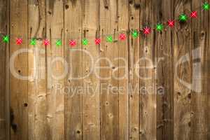 Lustrous Wooden Background with Green and Red Christmas Lights