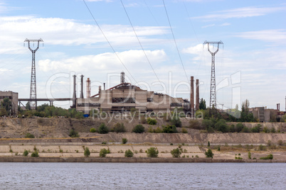 Panoramic view of ironworks on river coastline