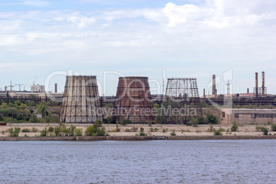 Panoramic view of ironworks on river coastline