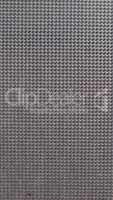 Grey plastic grid background - vertical