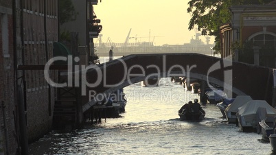 Boat Going Under Canal Bridge