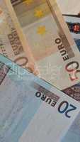 Fifty and Twenty Euro notes - vertical