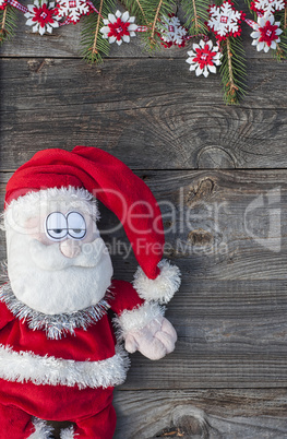 Christmas Santa Claus on a gray wooden surface