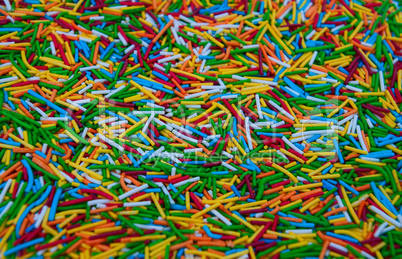 Colorful candy sprinkles heap