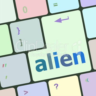 alien on computer keyboard key enter button