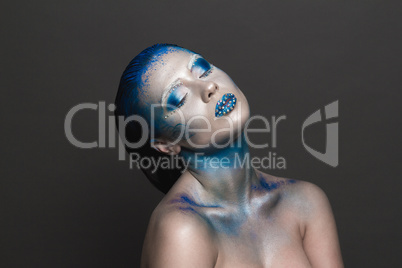 Art Makeup with Blue Hair and Rhinestones