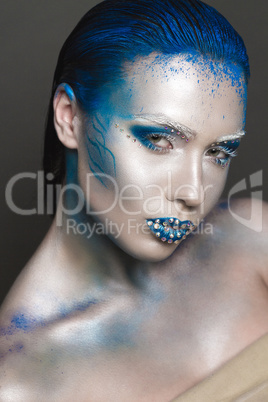 Art Makeup with Blue Hair and Rhinestones