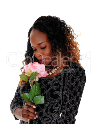 Pretty woman with pink rose.