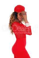 Woman in red dress and cap.