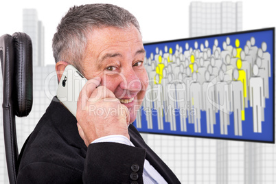 Man sitting by the phone at the workplace