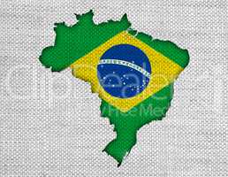 Karte und Fahne von Brasilien auf altem Leinen