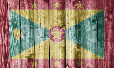 Fahne von Grenada auf verwittertem Holz