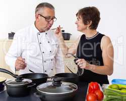 Woman with Chef Cook in the kitchen