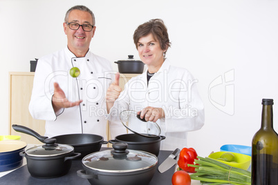 Woman with Chef Cook in the kitchen