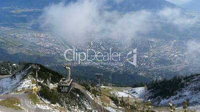 Cable car moving down the alps at Innsbruck