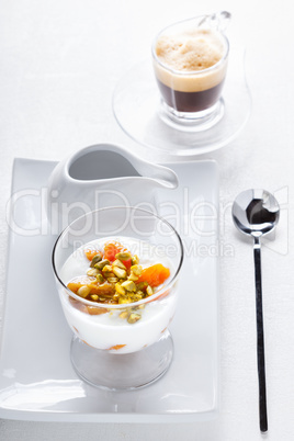 Yogurt with dried apricots and coffee