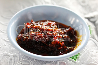 Thai Red Curry Paste in white dish.